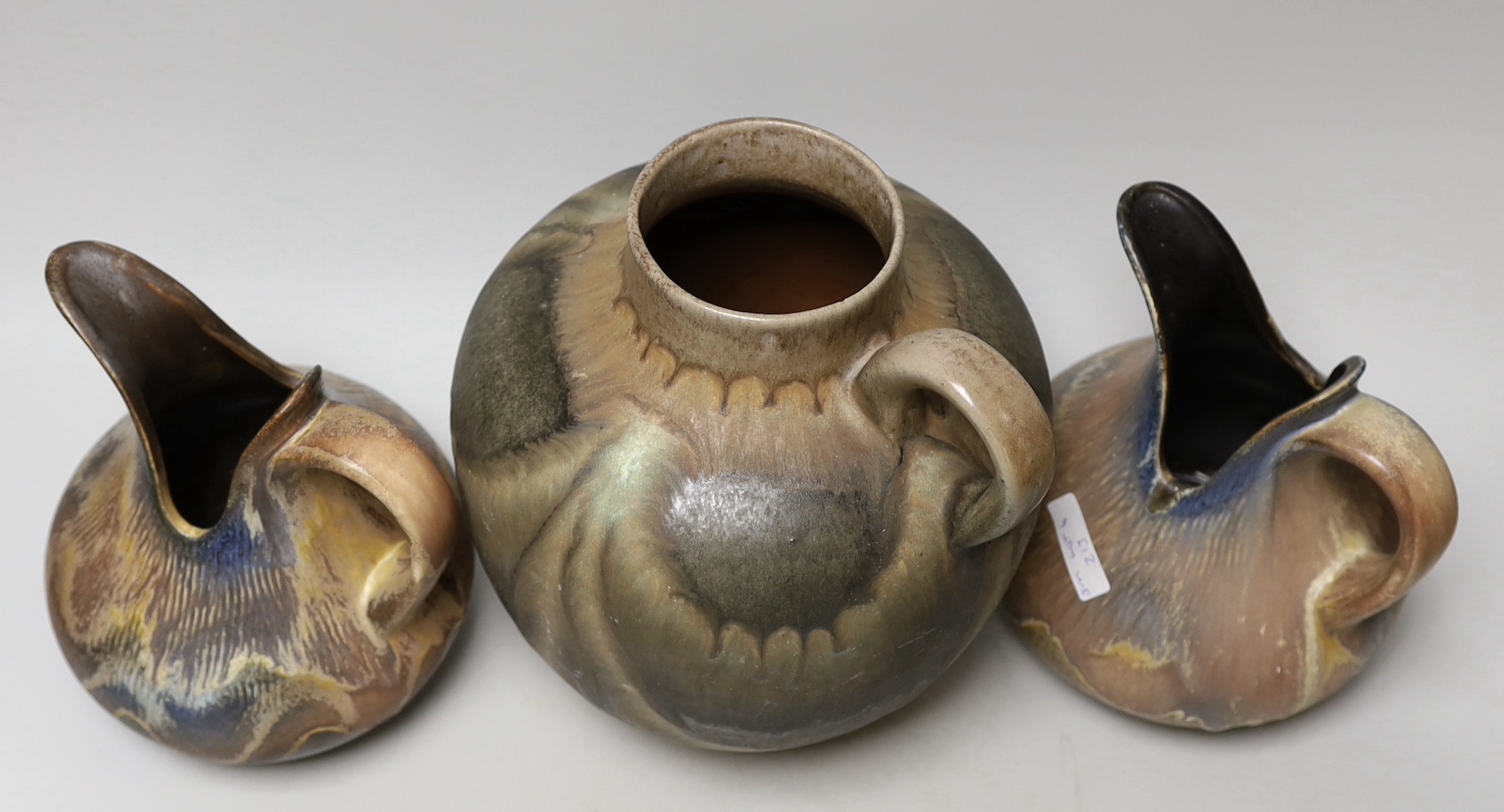 Three West German art pottery items; a pair of Dümler & Breiden, and a large ewer. Tallest 24cm